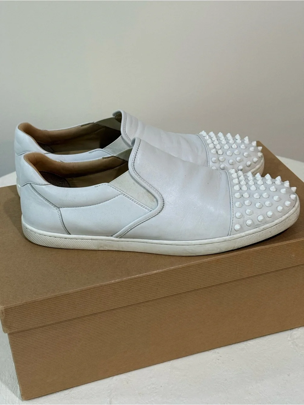 Christian Louboutin Men’s white boat sneaker spikes